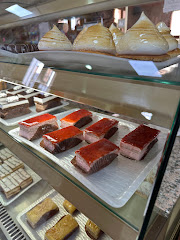 Pastelería Cafetería la Artesana S.L.L.