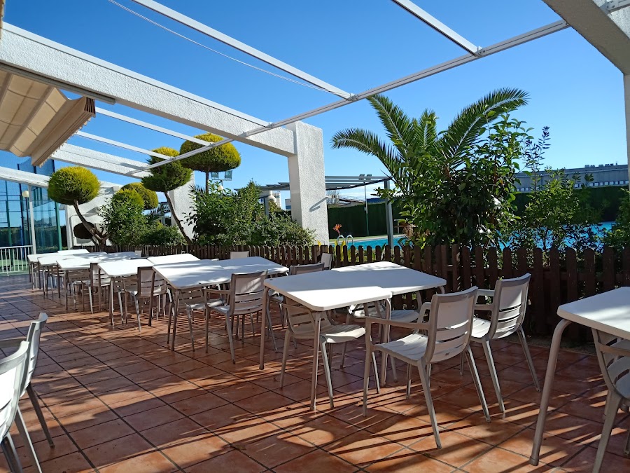 Arrocería Els Tarongers / Residencial Reva